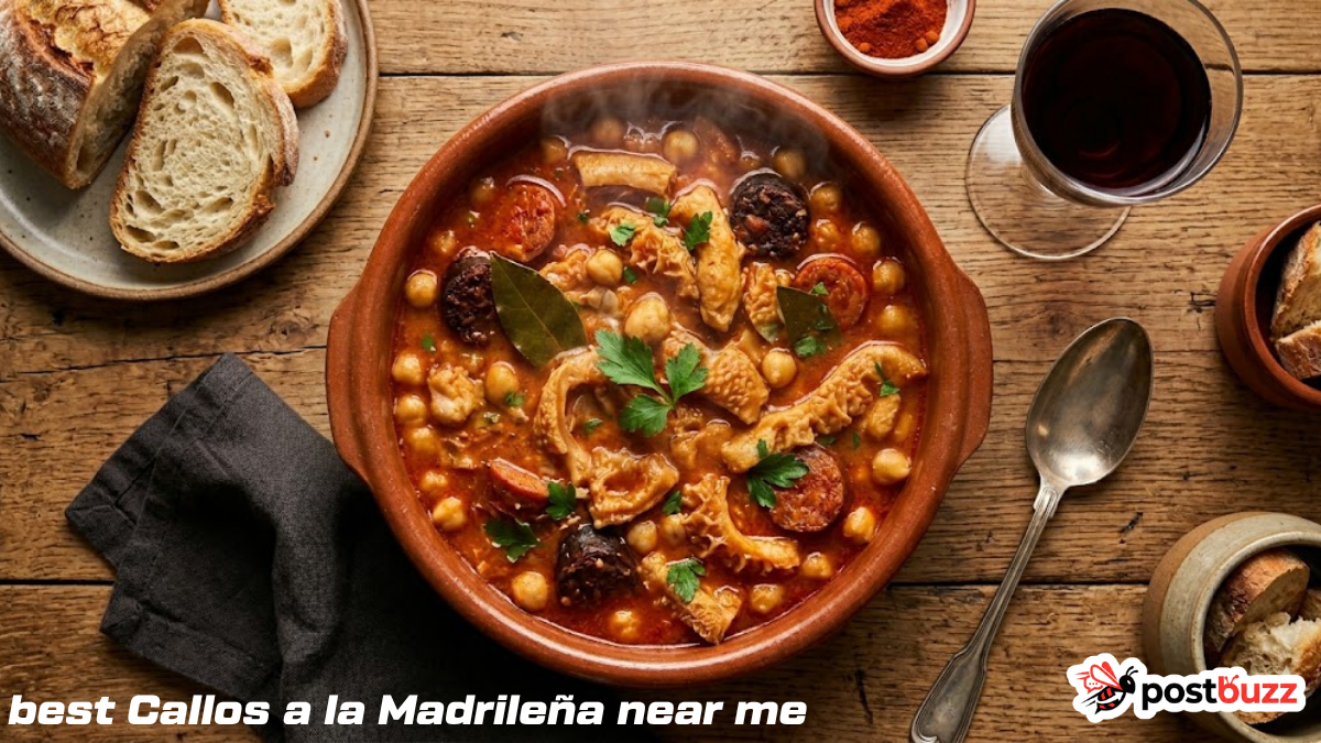 raditional Callos a la Madrileña stew served in a rustic clay bowl with crusty bread and wine.