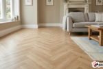 Herringbone laminate flooring installation in a modern UK home