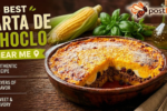 Best Tarta De Choclo (Chilean Corn Pie) featuring golden sweetcorn topping and rich pino filling, presented as an authentic traditional recipe.