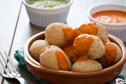 Delicious Canarian-style wrinkled potatoes served with traditional spicy mojo picón and green mojo sauce.