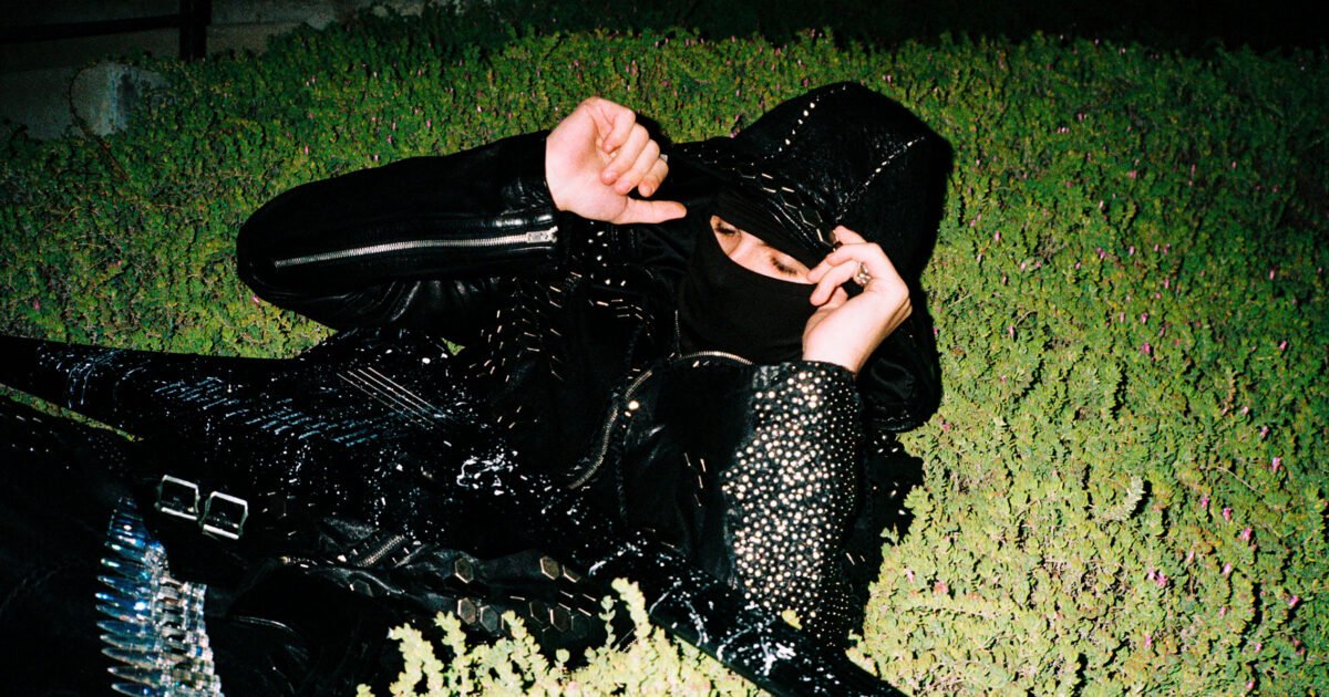 Esdeekid, the masked Liverpool rapper, performing in a balaclava